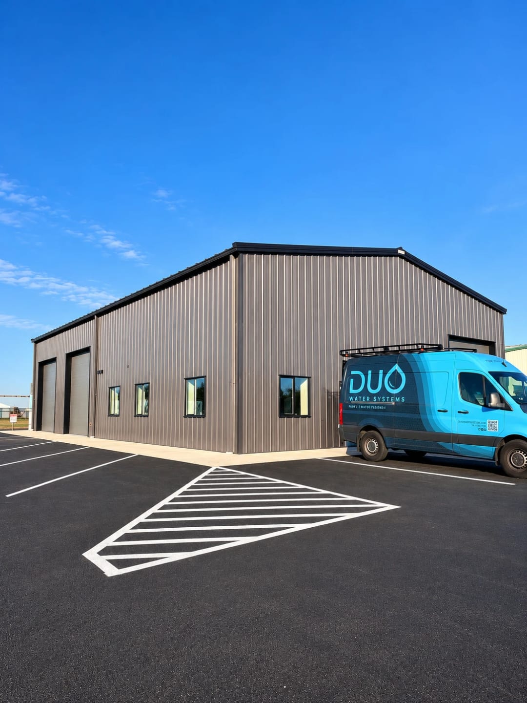 Duo Water Systems' new warehouse in Lebanon, Oregon, with a Duo service van